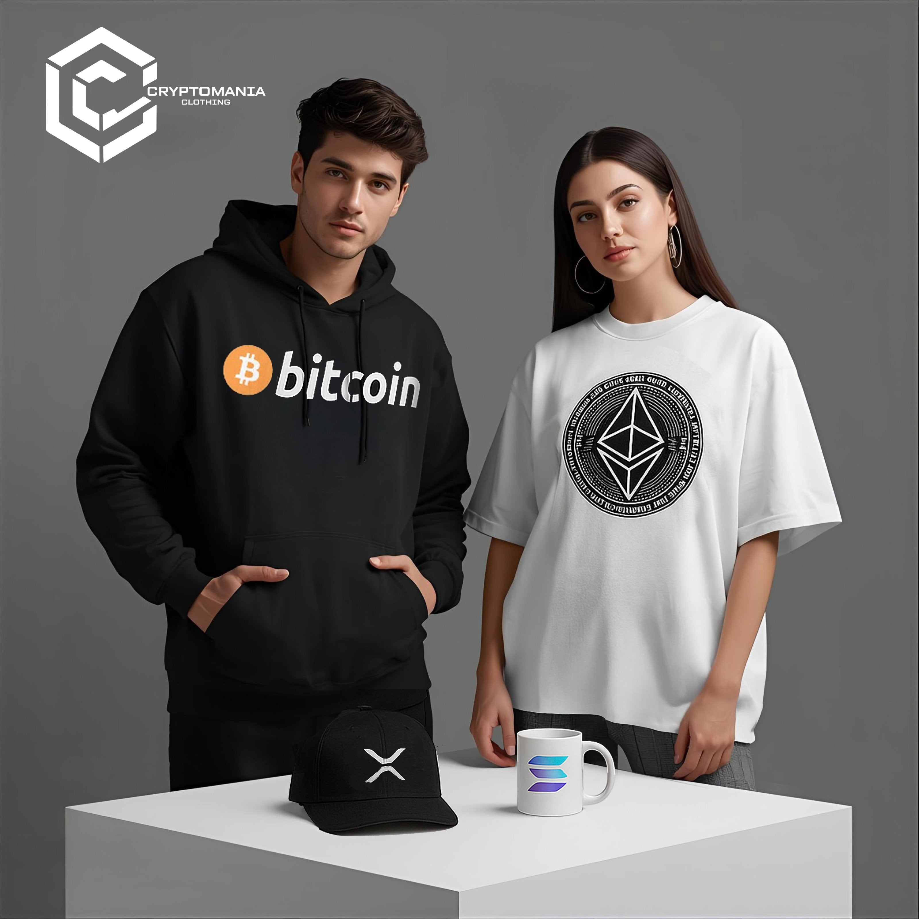 Models wearing Bitcoin hoodie, Ethereum T-shirt, and Solana cap from Cryptomania Clothing — crypto streetwear and accessories for men and women.