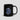 Bitcoin Alaska Flag Mug — black glossy ceramic coffee cup with the Alaska flag and BTC mark, front view