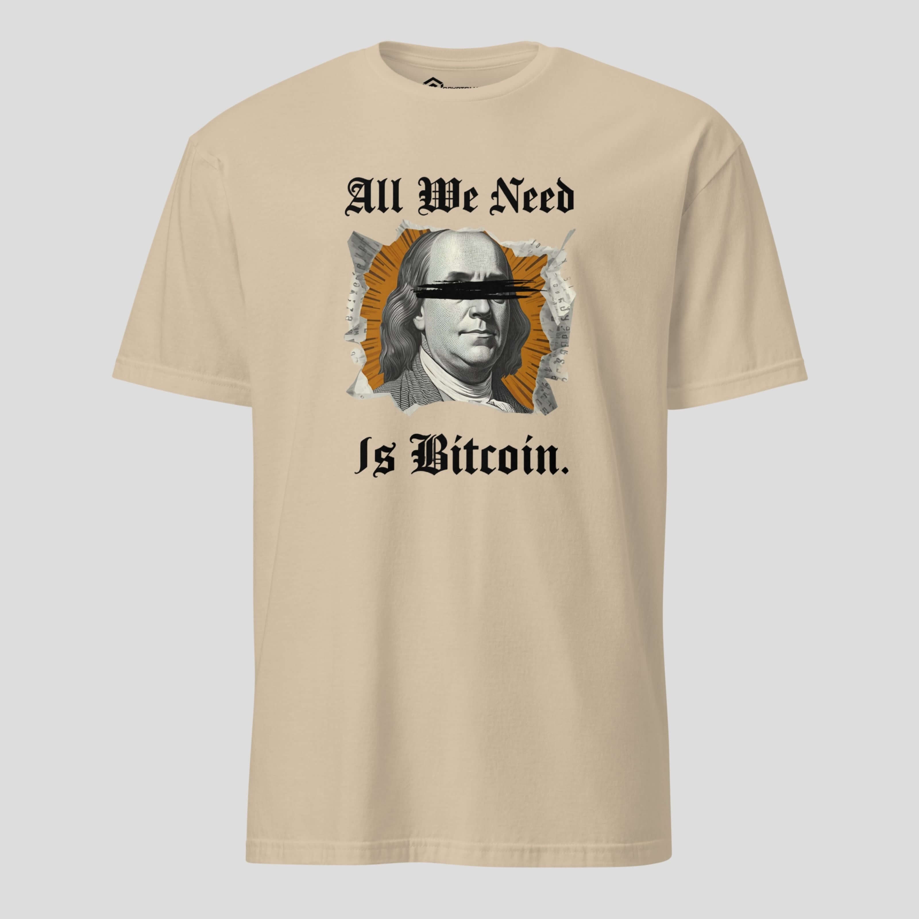Beige Bitcoin quote t-shirt featuring “All We Need Is Bitcoin” crypto statement design