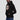 Model wearing the black AVAX Decentralized Since Day One Hoodie, showing the relaxed unisex fit