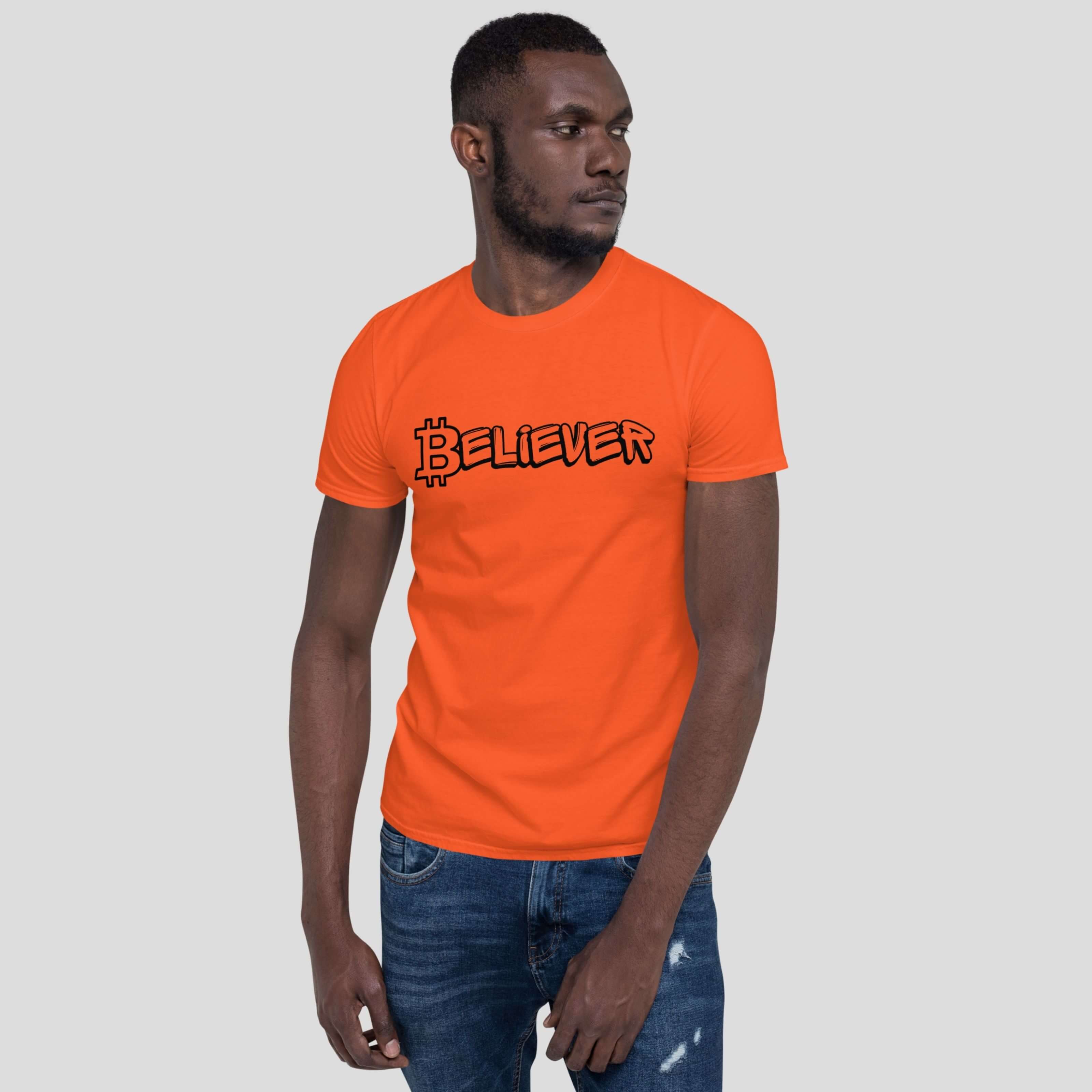 Male model in an orange bitcoin believer t-shirt