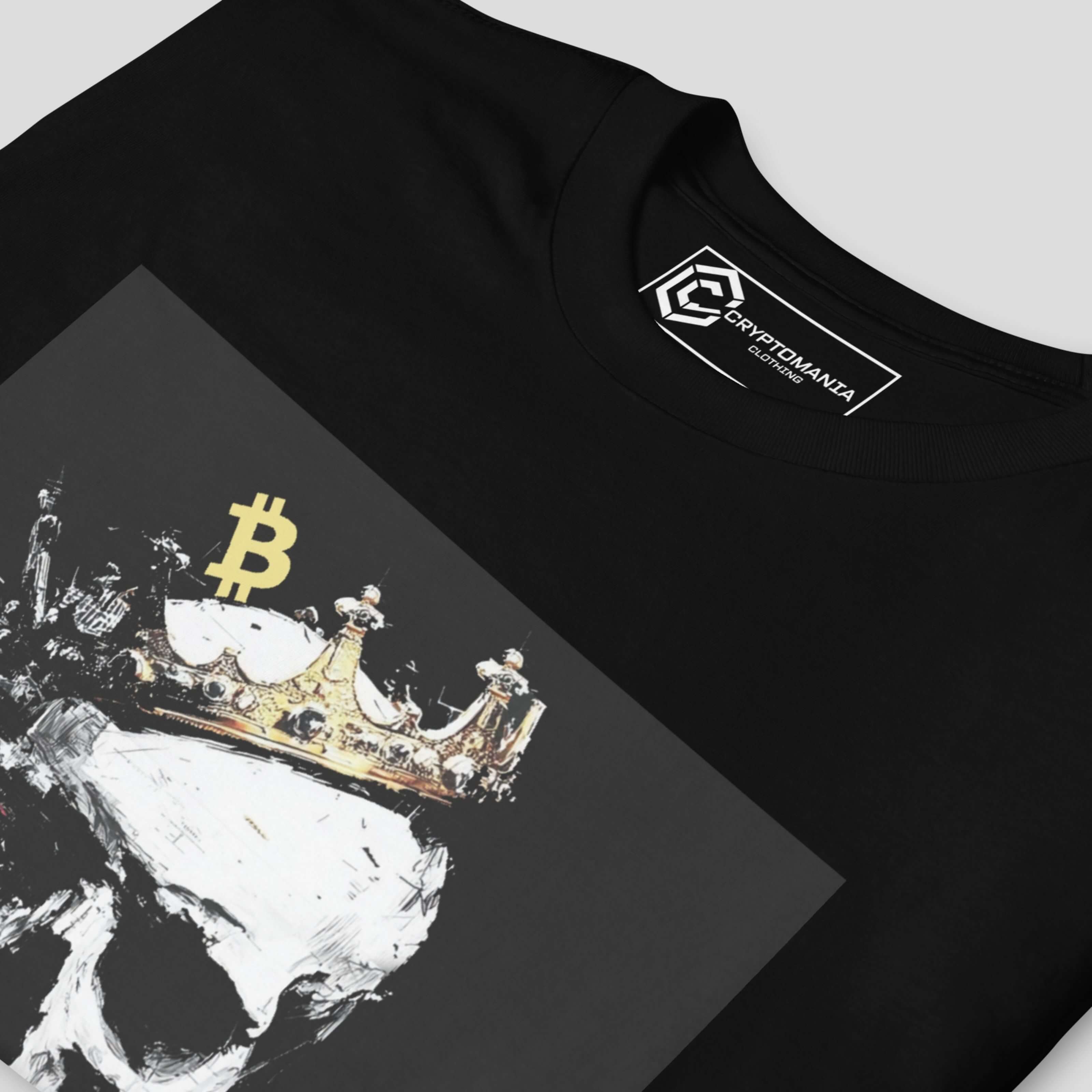 Close-up of bitcoin crown skull artwork on black premium unisex t-shirt