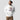 Model wearing the white Cryptonaut Hoodie, showing the relaxed unisex fit