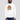 Model wearing the white The First Bitcoin Is the Hardest Hoodie, showing the relaxed unisex fit