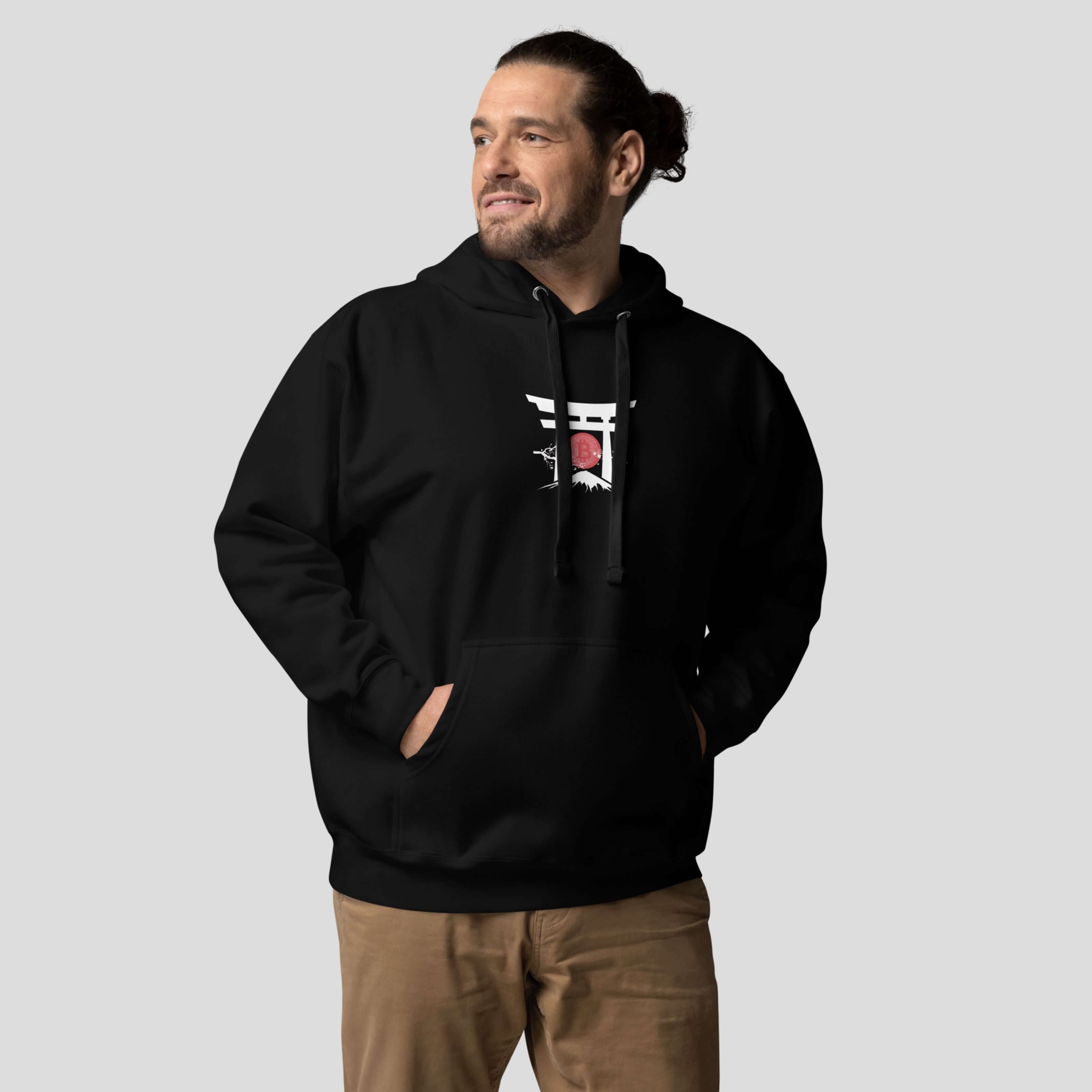 Man posing with a black bitcoin hoodie with a torii gate chest stamp