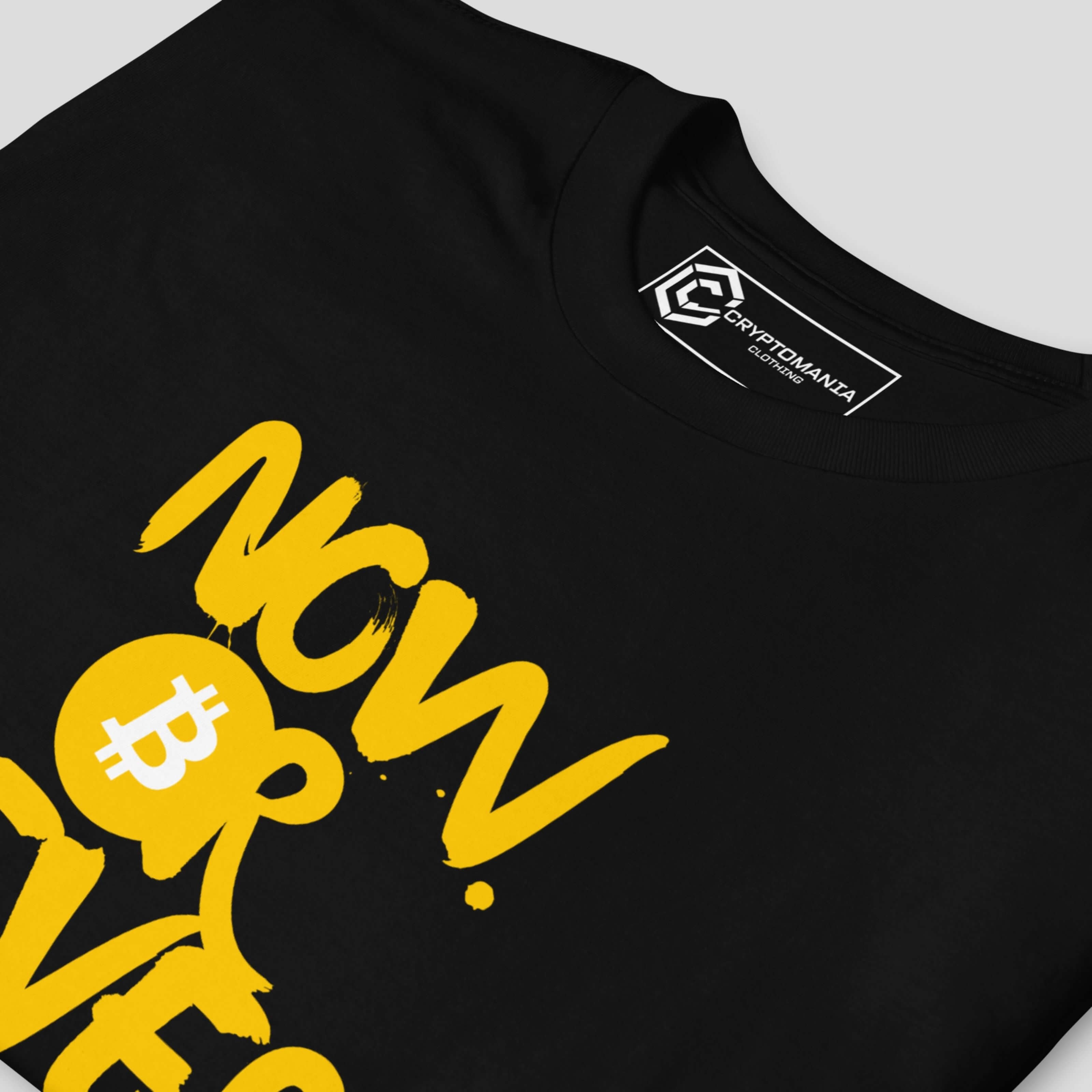 Close-up of bitcoin slogan print on black crypto t-shirt fabric