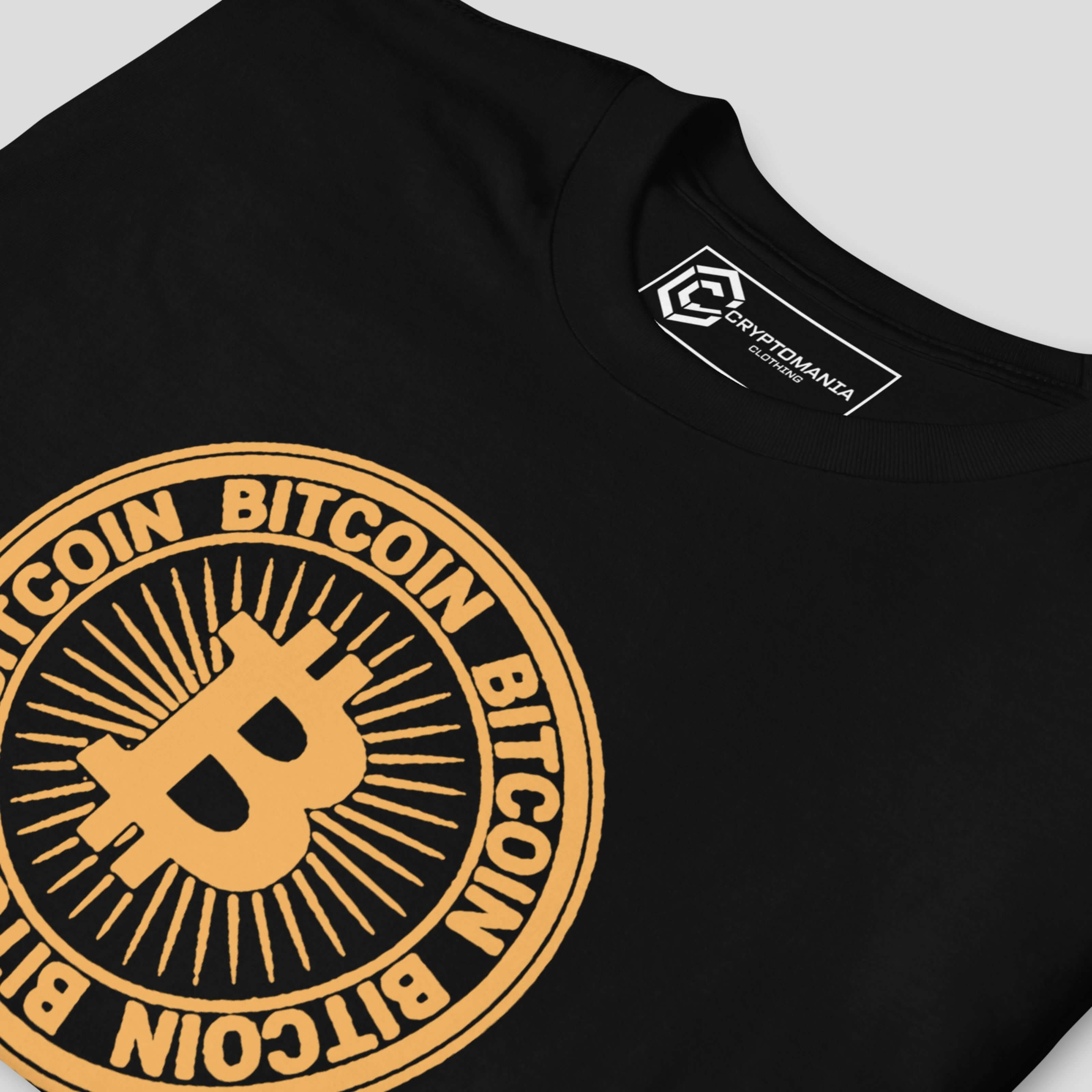 Close-up of circular Bitcoin inspired emblem print on black crypto streetwear t-shirt