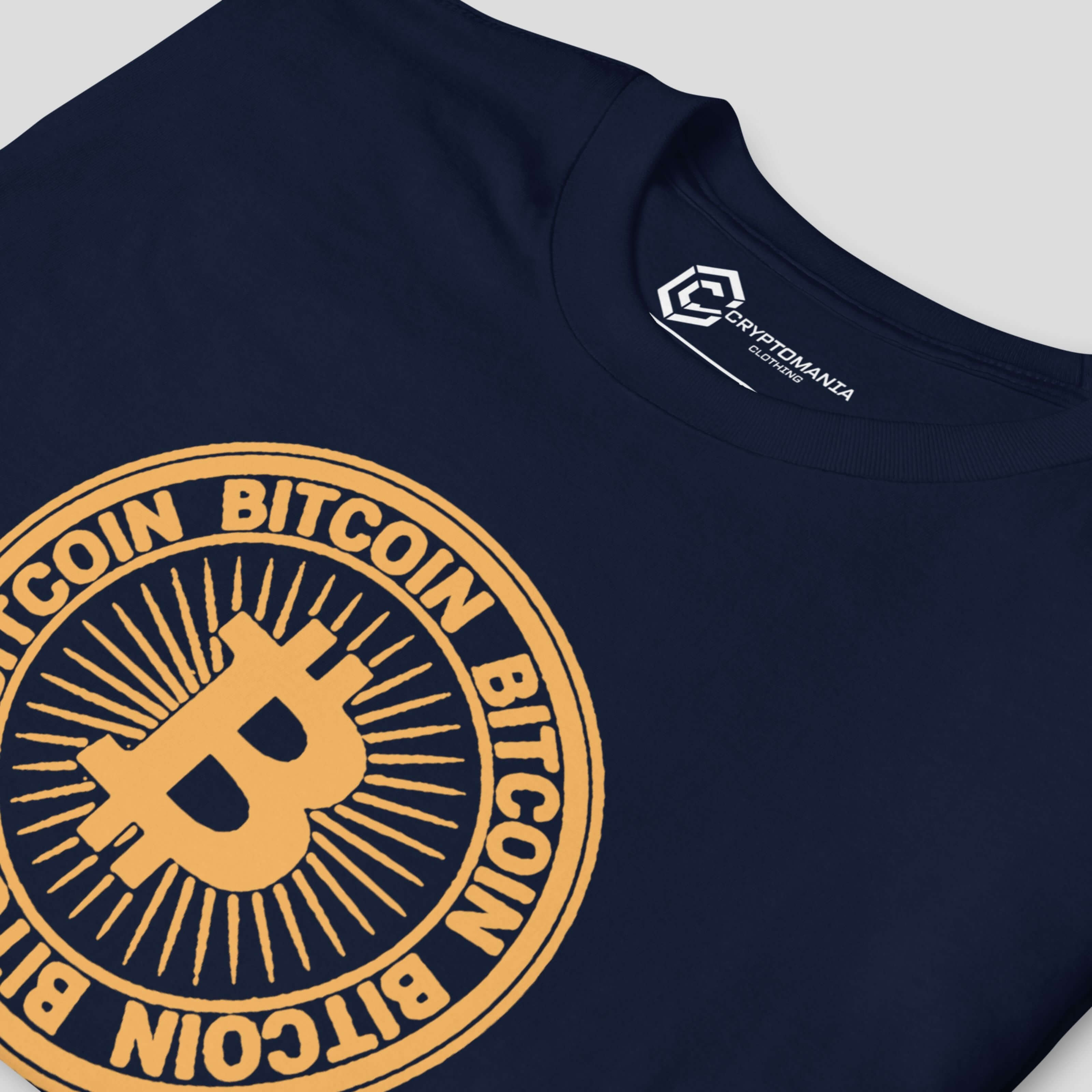 Detailed view of circular Bitcoin inspired graphic on navy blue crypto t-shirt