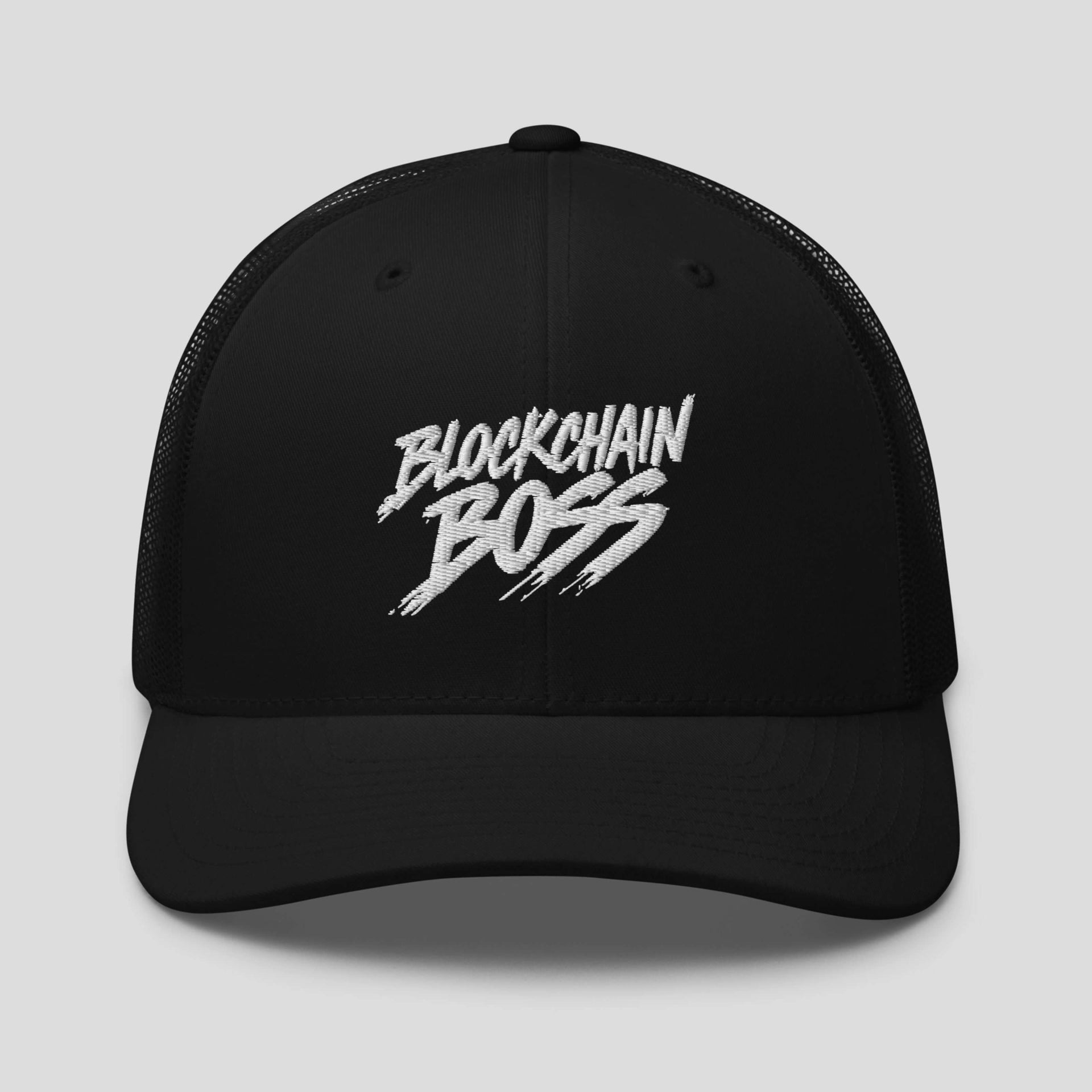 Black trucker cap with embroidered Blockchain Boss text in bold crypto streetwear style