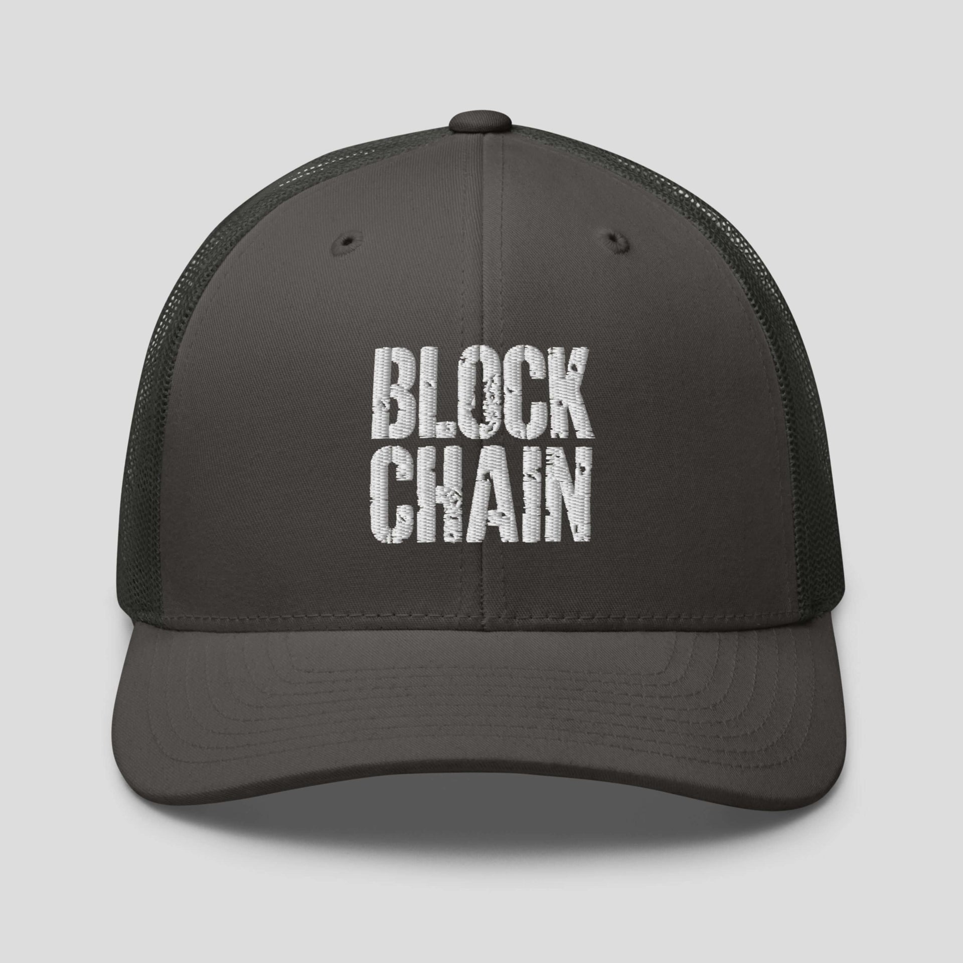 Grey trucker cap with embroidered Blockchain text in minimalist crypto streetwear style