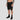 Binance Performance Shorts side view — black crypto activewear showing the straight-leg fit