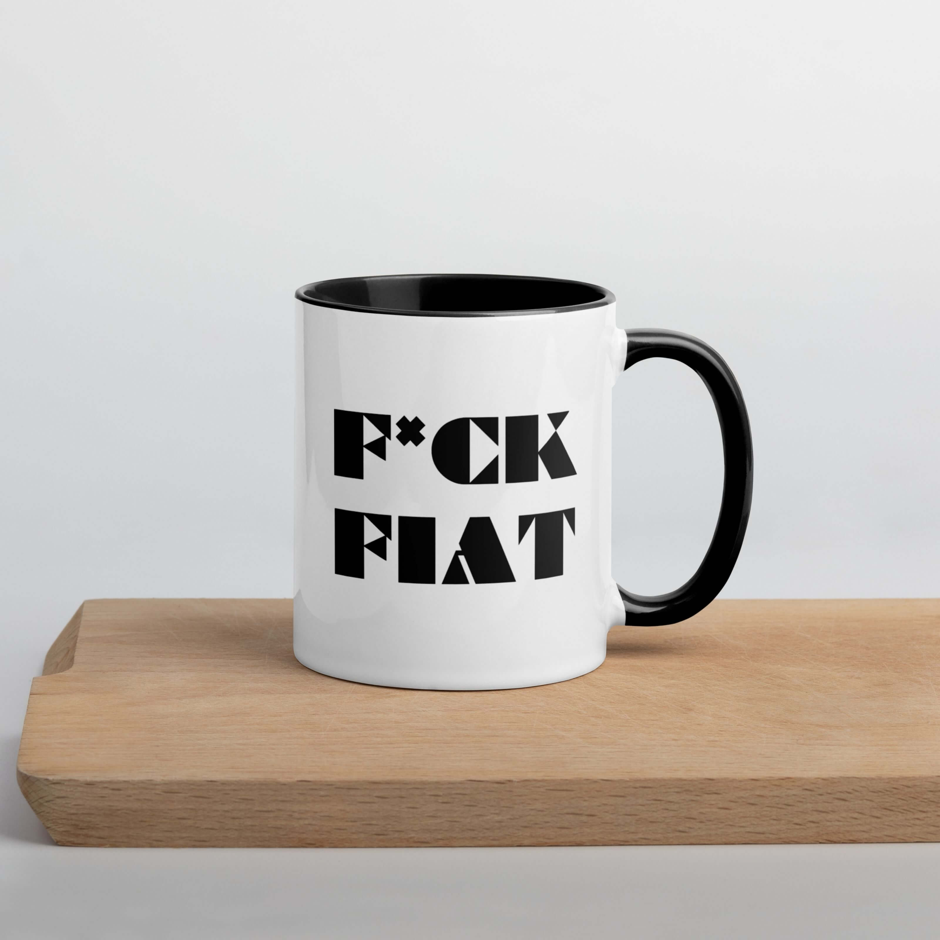 Fuck fiat mug on desk surface representing crypto ideology and sound money