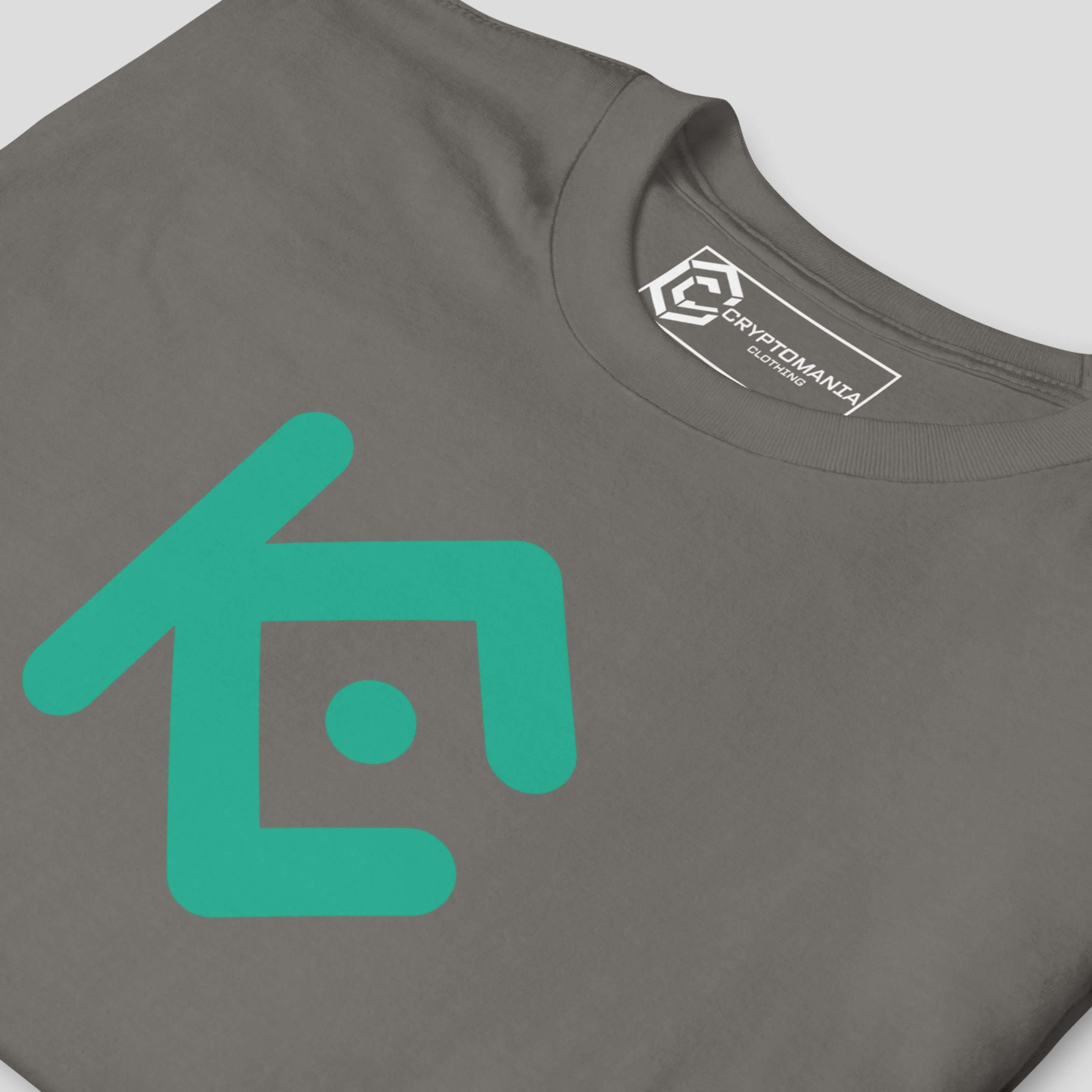 Close-up detail of gray KuCoin inspired t-shirt print showing smooth ink texture, sharp edges, and modern crypto fashion aesthetics
