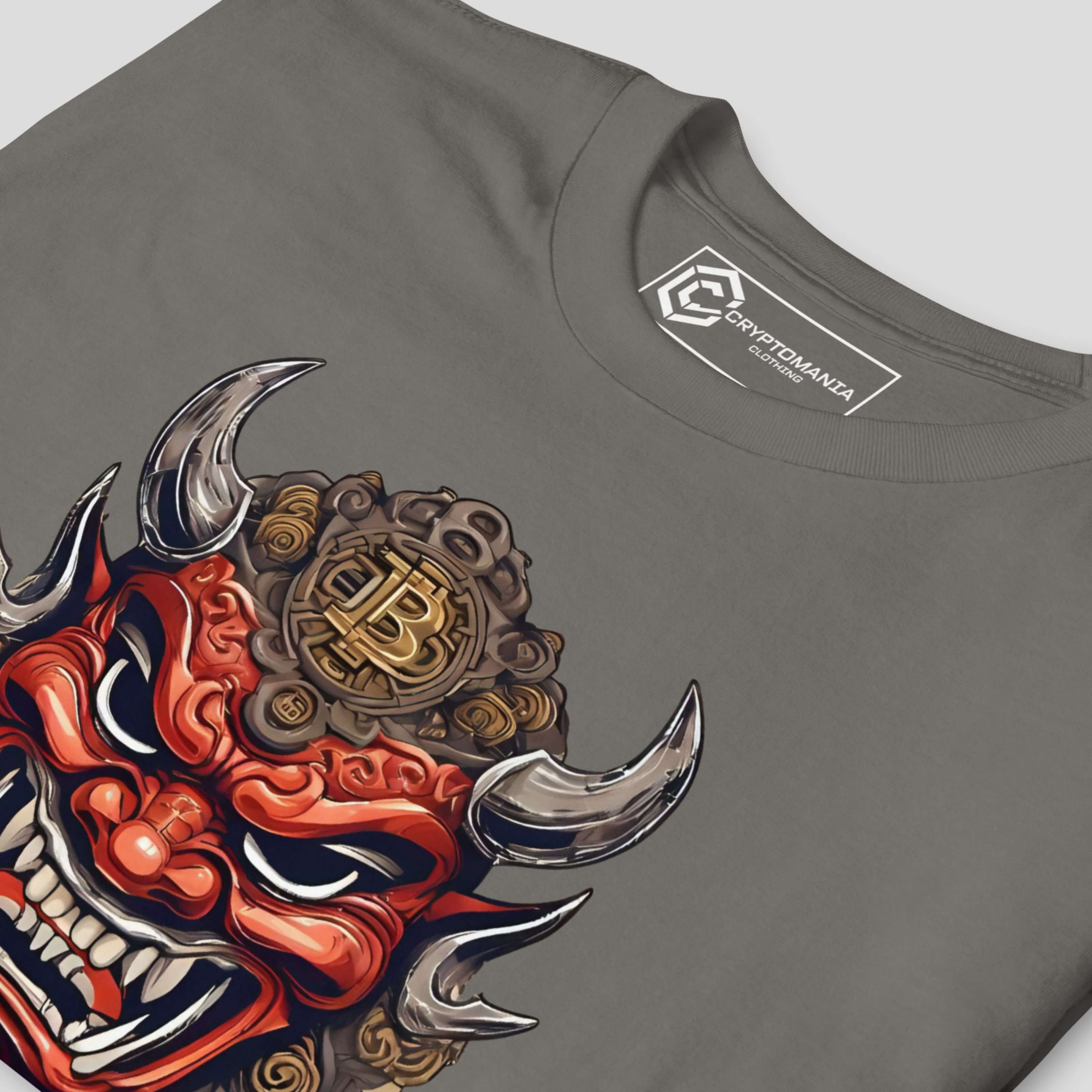 Detailed view of oni mask graphic on grey crypto t-shirt highlighting texture, sharp lines, and bold illustration style