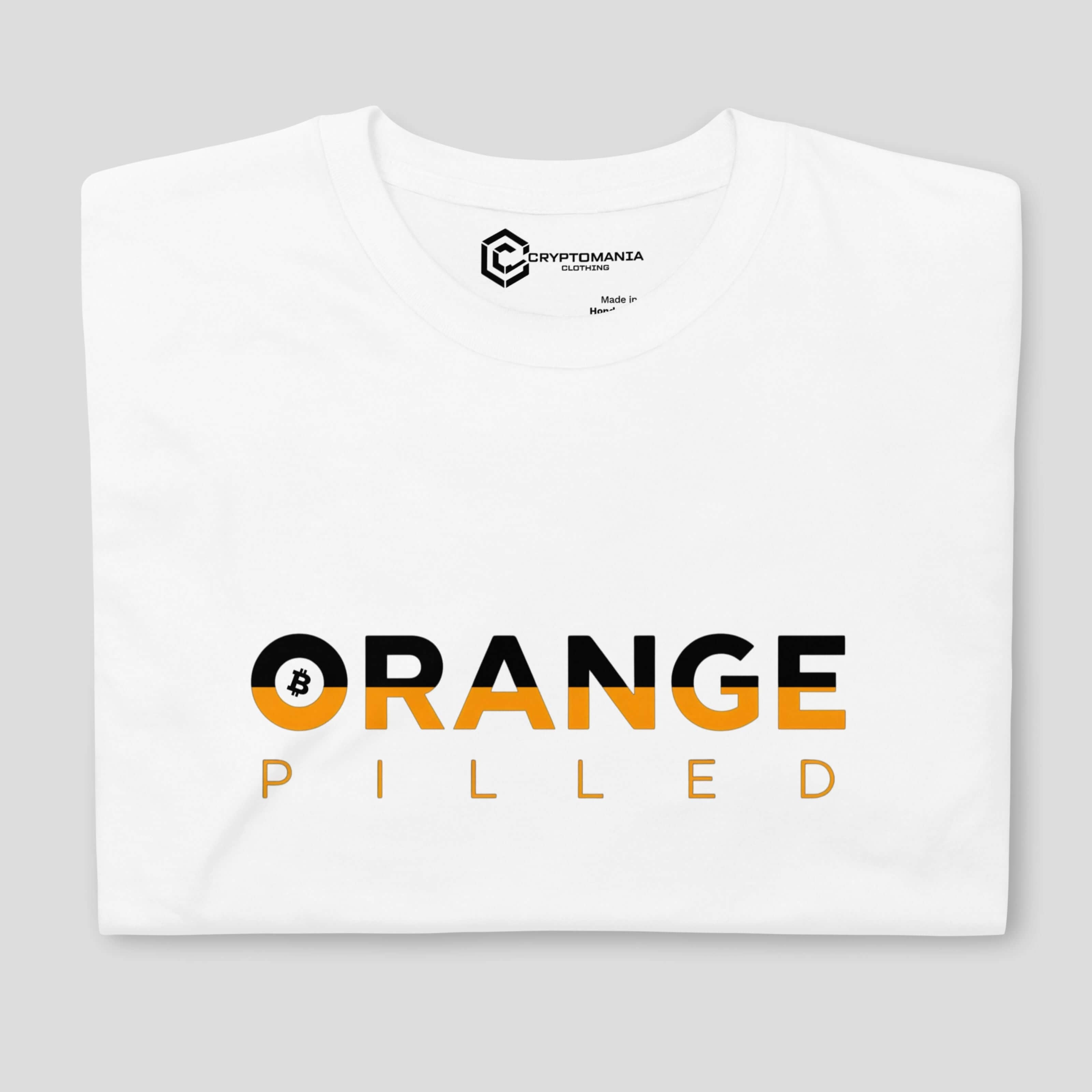 Close up Orange Pilled Bitcoin typography design on white t-shirt