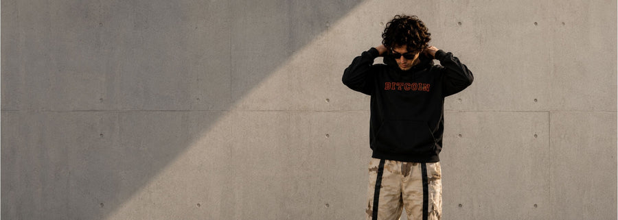 Premium crypto clothing collection featuring streetwear hoodies, t shirts and Web3 apparel for traders and investors