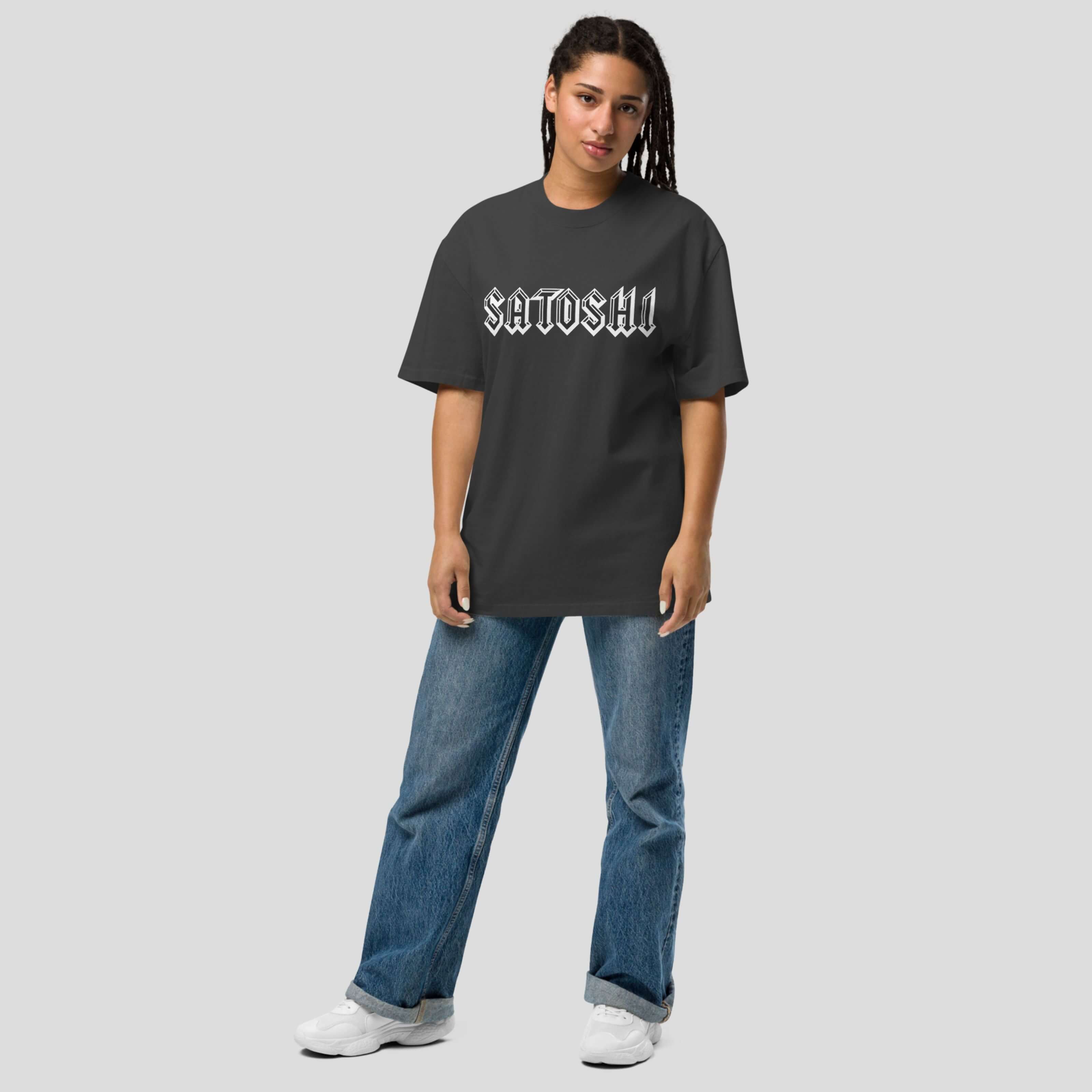 Female model wearing oversized Satoshi crypto t-shirt in street style outfit