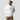 Model wearing the white Instant Global Decentralized Hoodie, showing the relaxed unisex fit