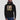 Model wearing the black Justice Served Hoodie, showing the relaxed unisex fit
