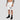 XRP crypto shorts shown on a model at the gym, white colourway lifestyle view